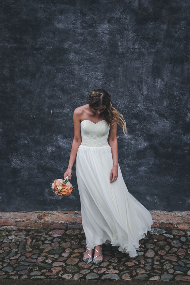 A photo of a new bride in an A-line wedding dress