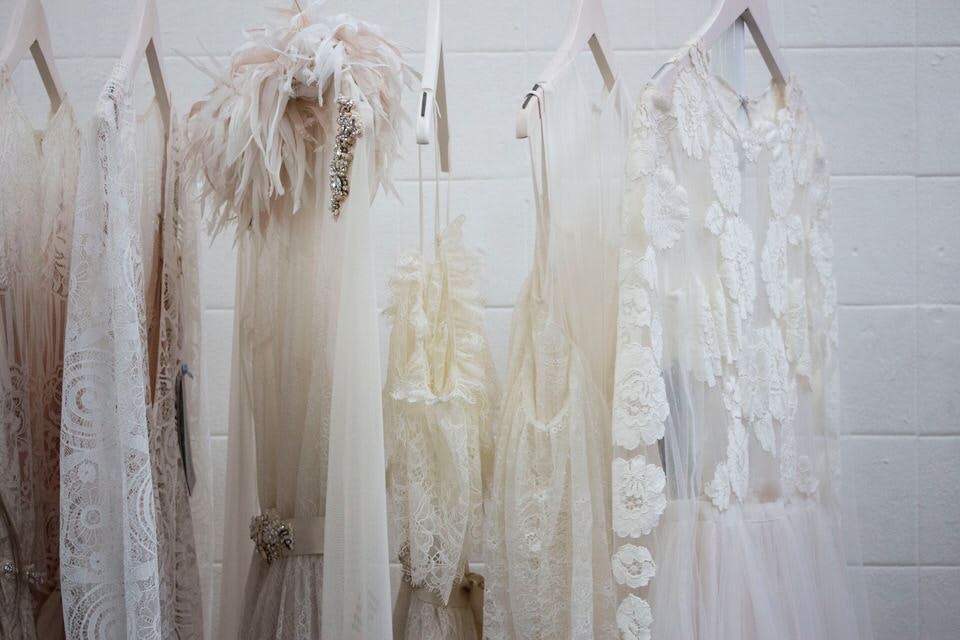A photo of a variety of wedding dresses