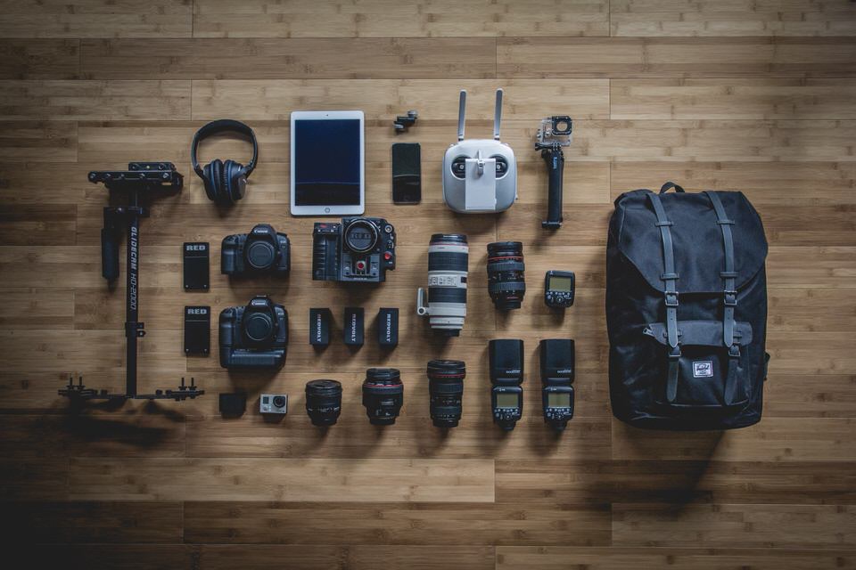 A flat lay photo of camera gear 