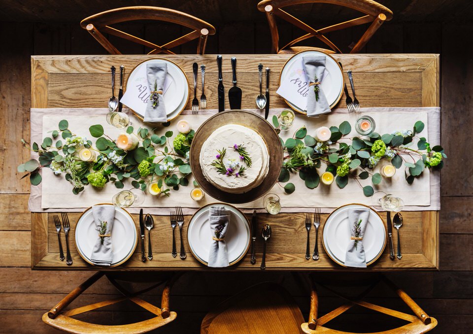 A photo taken from above of a wedding table setting