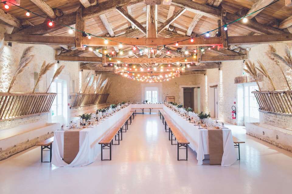 A photo of a wedding reception and tables